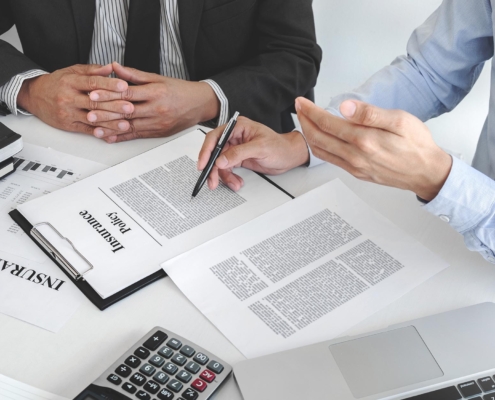 Business people looking over paperwork